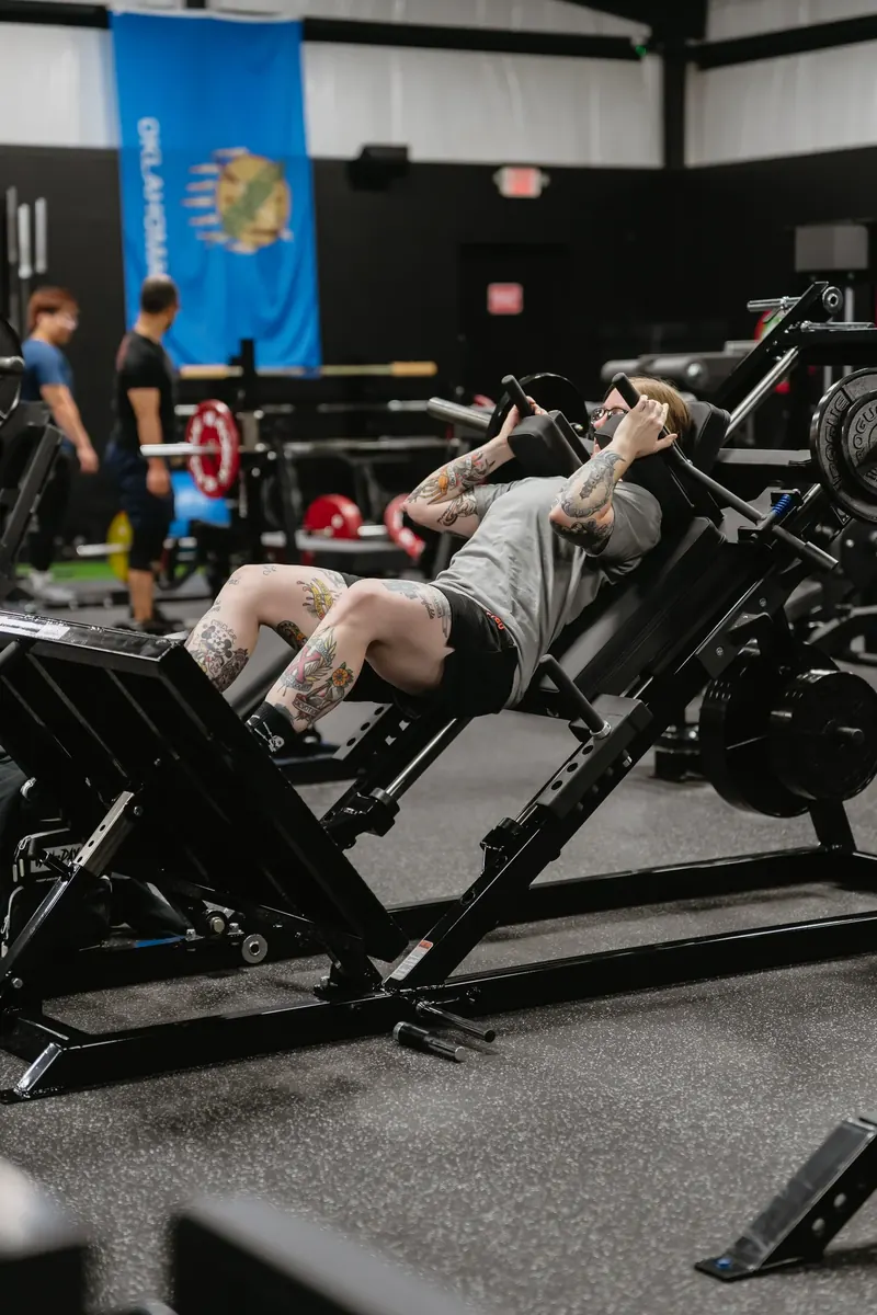 Members training on the gym floor at Black Wall Strength in Edmond, OK