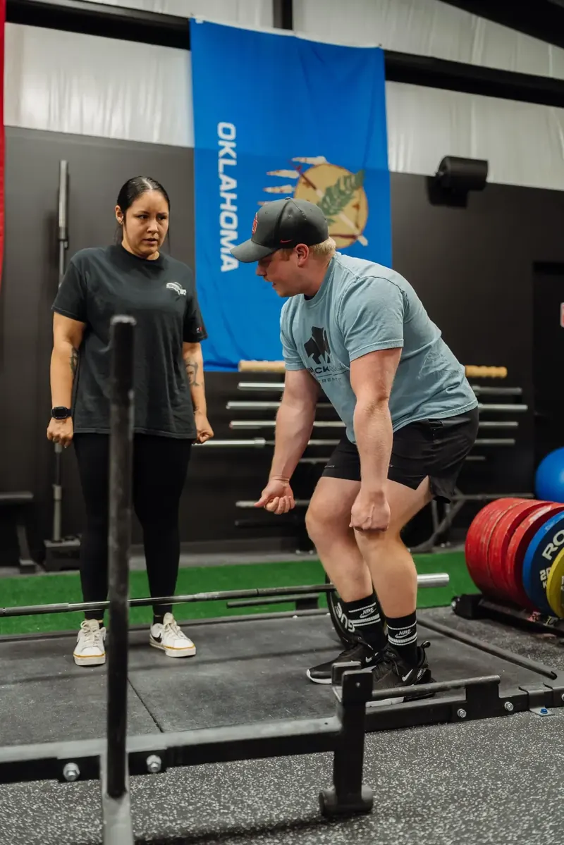 Personal training session with a coach at Black Wall Strength in Edmond, OK